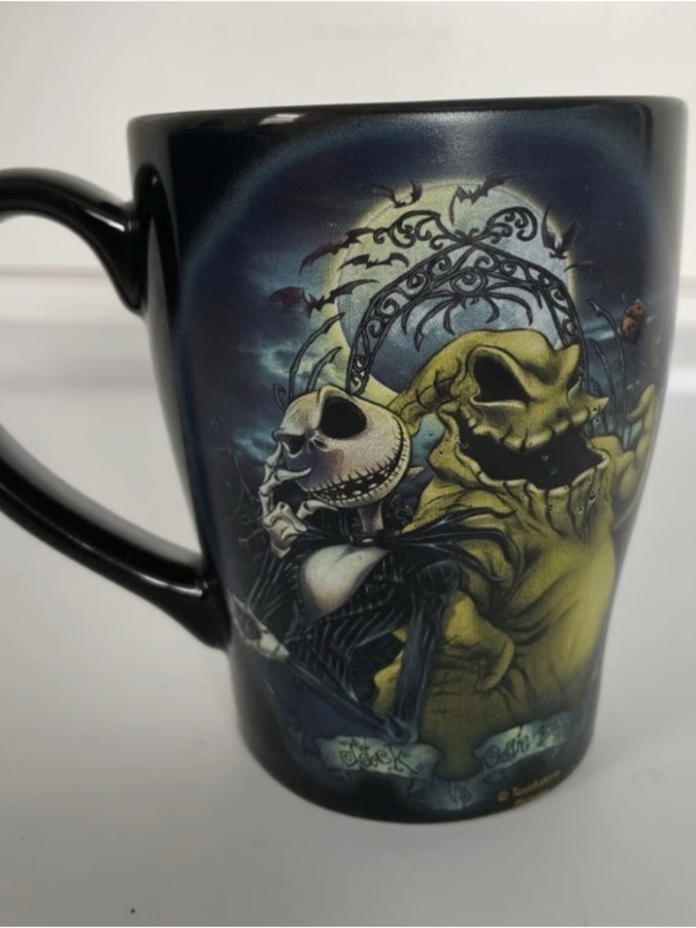 Skull Duo Ceramic Mug in Black and Green